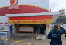 Ejecutan a encargado de carnicería al abrir negocio.